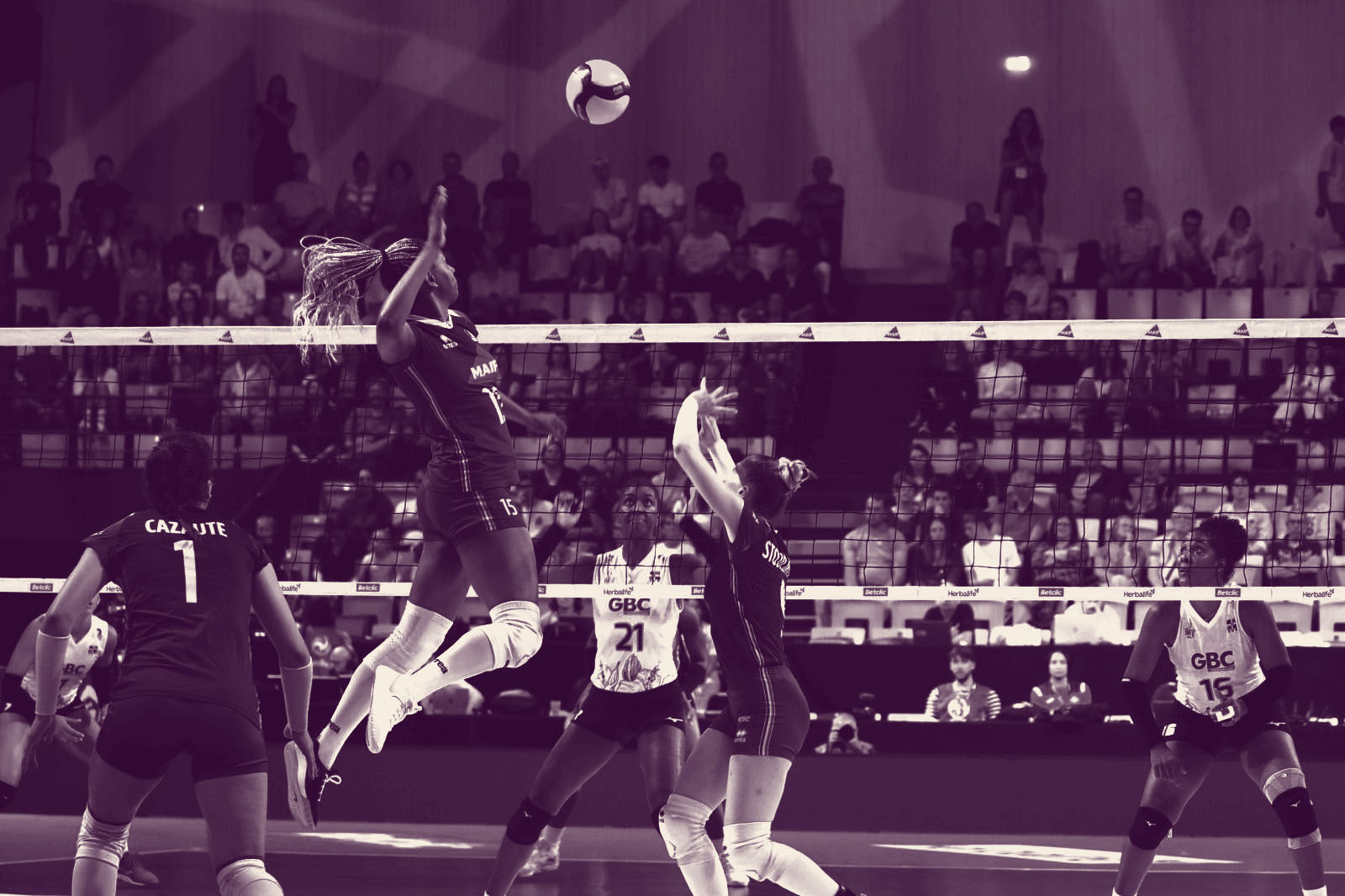 A women's volleyball team in action